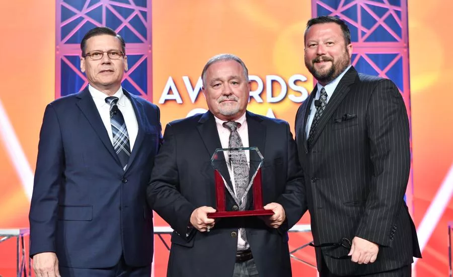 Structure-Works-Milt-Newman-accepting-for-Jim-MunceyWEB.jpg