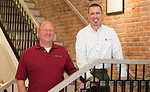 Sonitrol of Evansville's Chris Dingman (right) and security consultant Andrew Beitler visit a customer's business