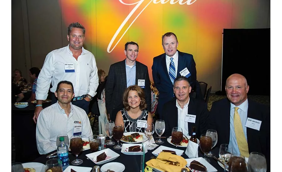 This is the 10th year AXIS has sponsored the SDM 100 Gala — pictured here with Vector Security
