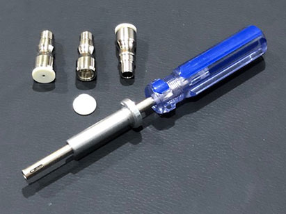 These are cable terminators. They are used on amplifiers and/or splitters when the number of outputs exceeds that which is required. The tool shown here is used to install and to remove the terminators. - SDM Magazine