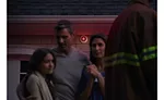 family outside with fireman