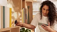 Google Nest Women setting up Google Nest