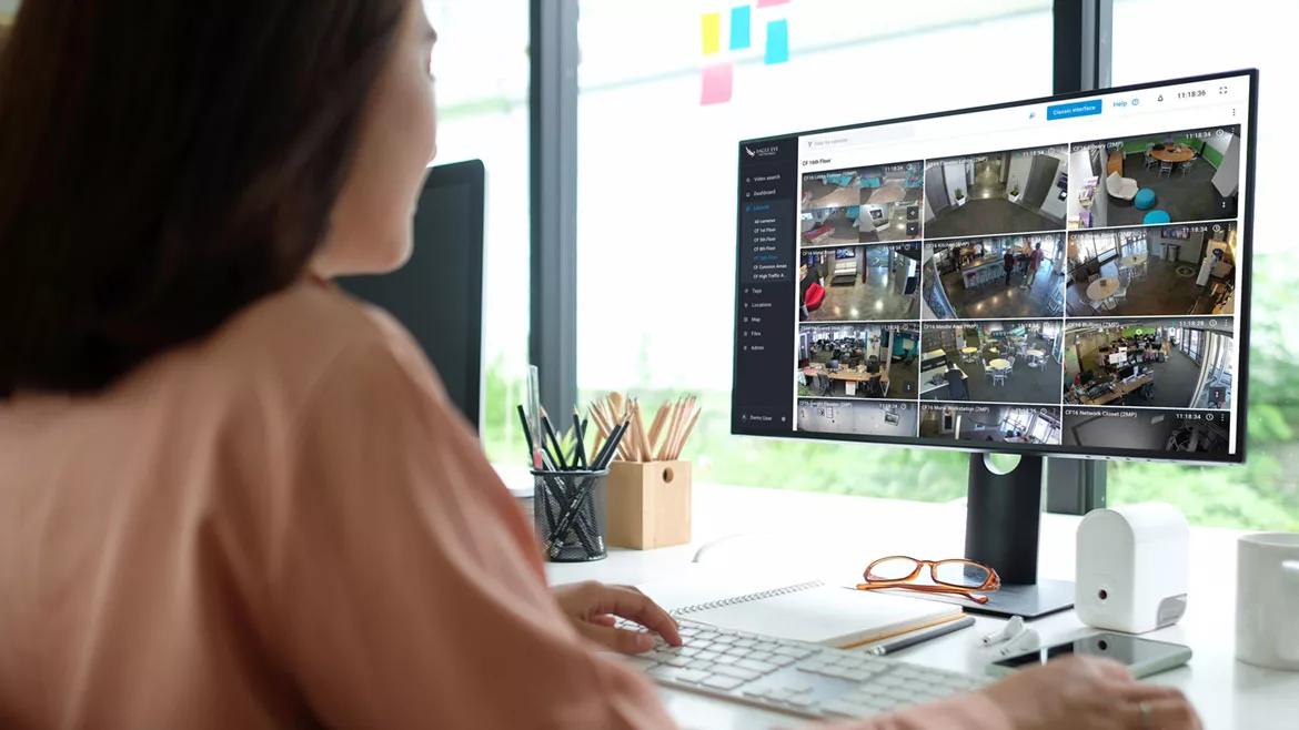 Woman watching security video