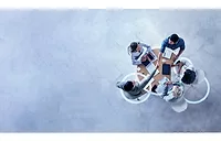 image of four professionals at a table