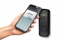 PSIA PKOC in a Minute image of a phone being used for a mobile credential