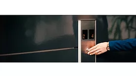 Pressing an elevator button
