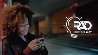 image of woman using cell phone