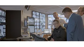image of security pofessionals remotely monitoring 