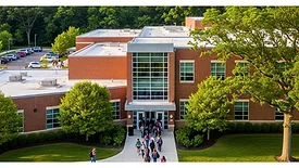 Children Walking Into a School