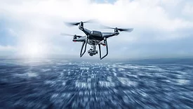Drone Flying Above City