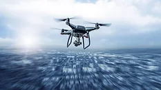 Drone Flying Above City