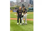 image of Pittsburgh Police Chief throwing out the first pitch
