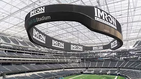 Image of IMRON on a Jumbotron at a stadium.