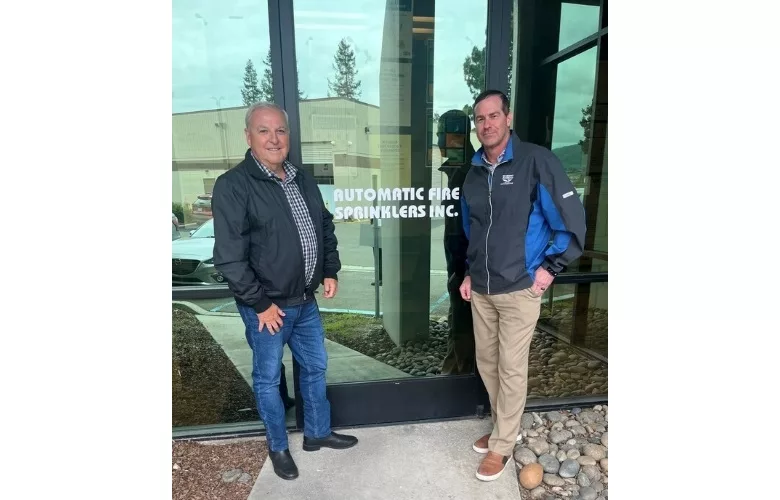 Image of Rod DiBona, COO of Pye-Barker's sprinkler division, and Gary Peterson, president and CEO at Automatic Fire Sprinklers.