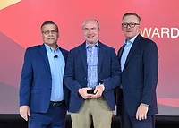 Image of Per Mar accepting Resideo's Premier Partner Award.
