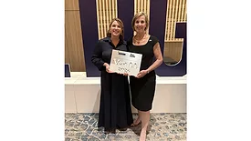 scDataCom Leader Accepts Award