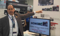 Thomas Cook demonstrates SamsungÃ¢??s new IP surveillance kits during ISC West. PHOTO BY SDM STAFF
